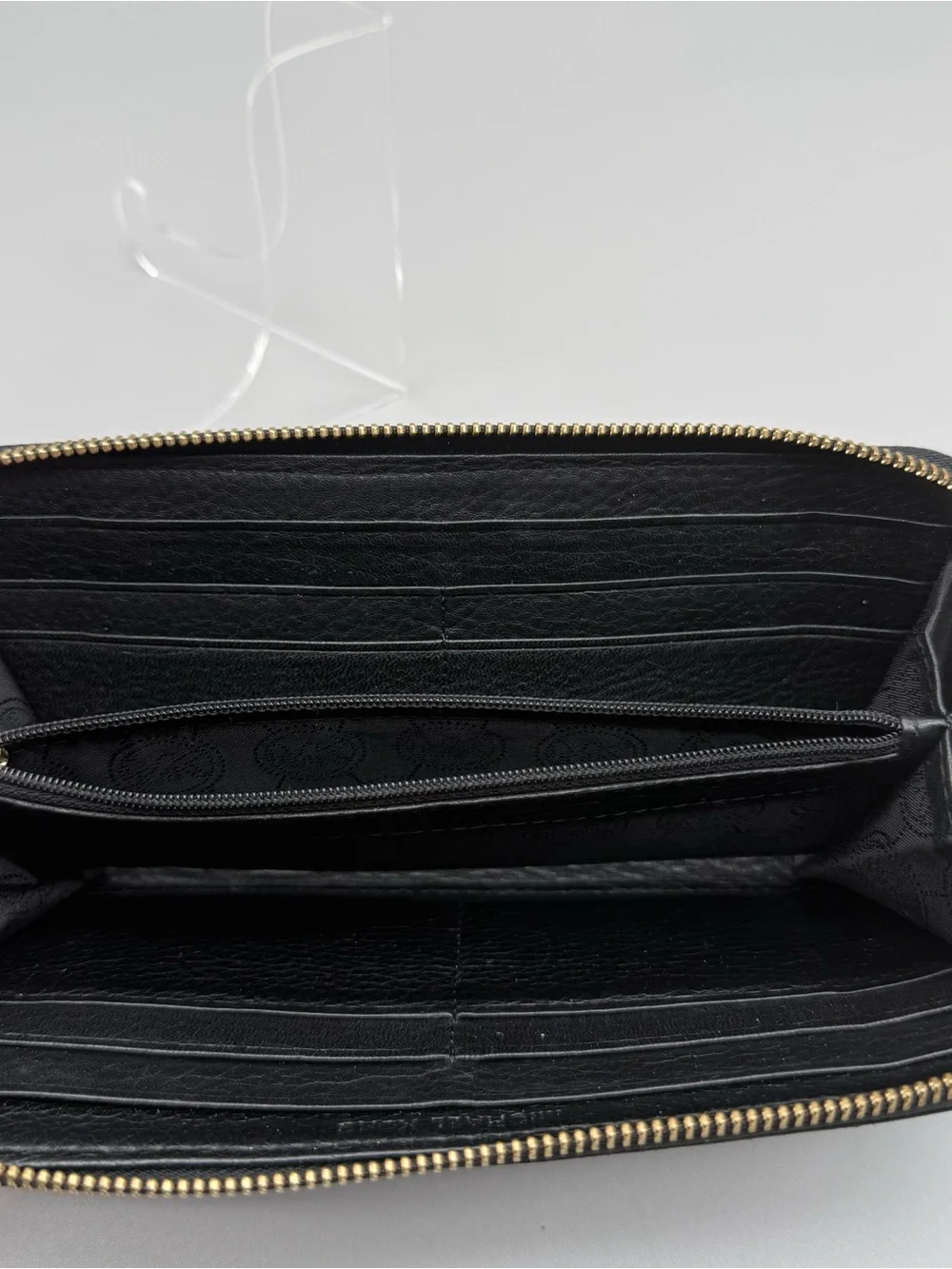 Michael Kors Black Pebbled Leather Zip Around Continental Wallet Logo Plaque